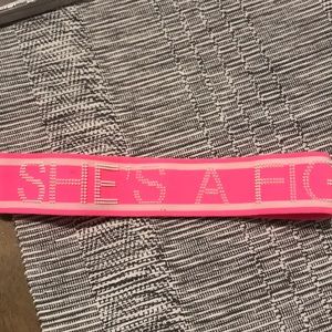 Under armor headband saying she’s a fighter